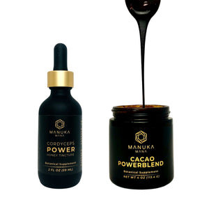 Cordyceps Power Tincture next to a jar of Cacao Powerblend.